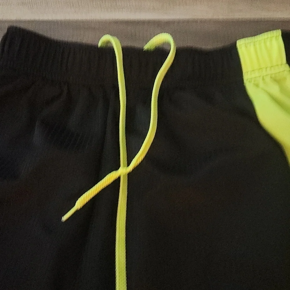 NIKE Atheletic Shorts Size Medium  Black and Yellow